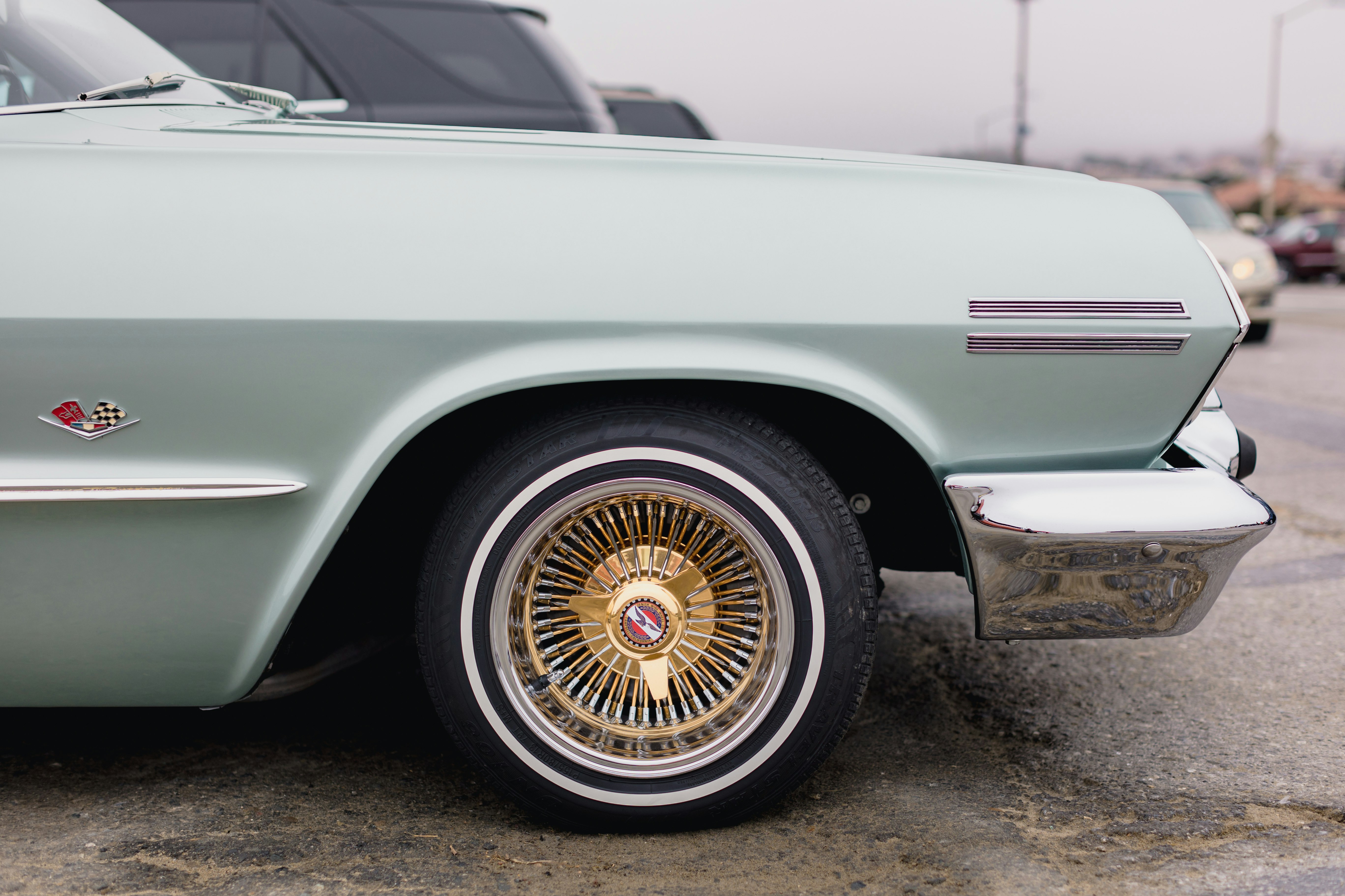 white car with yellow wheel